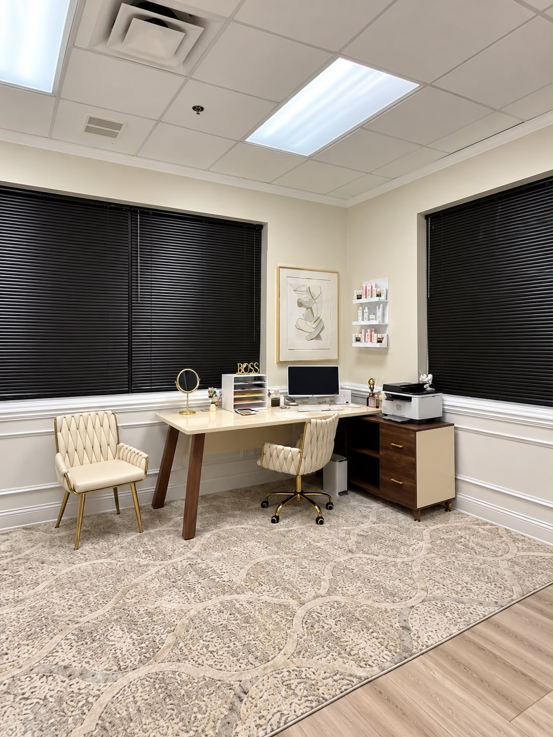 Spa consultation office with desk and guest chairs