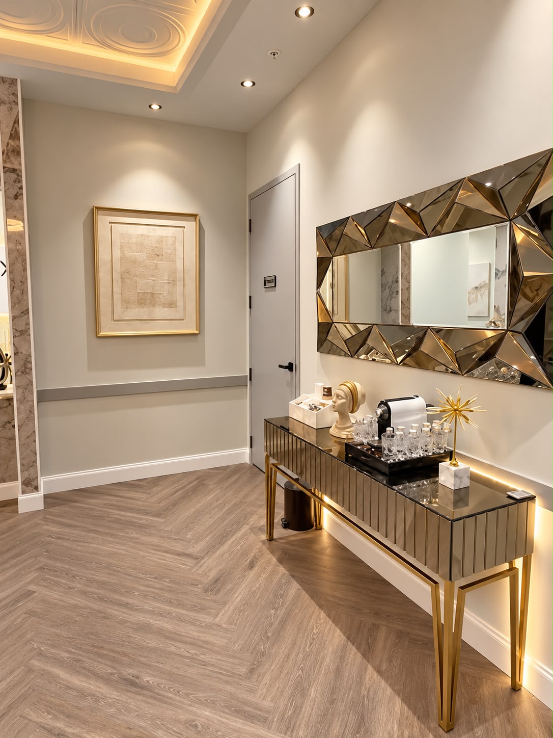 Spa bathroom vanity with warm metallic finishes