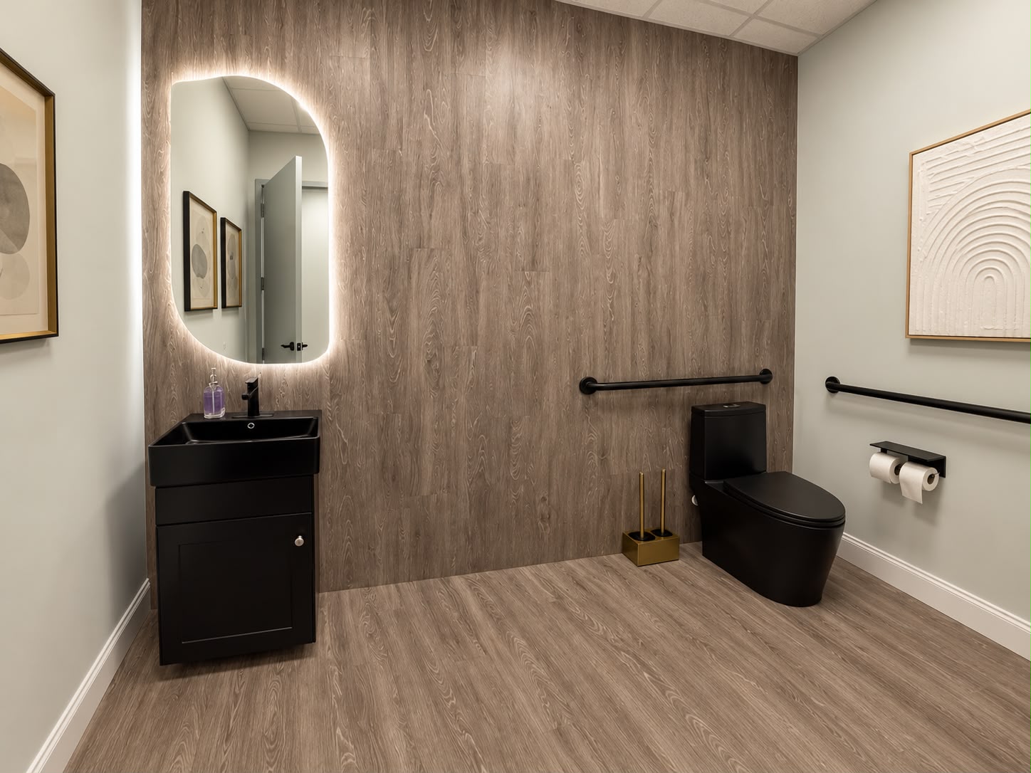 Modern spa restroom with dark tile finishes